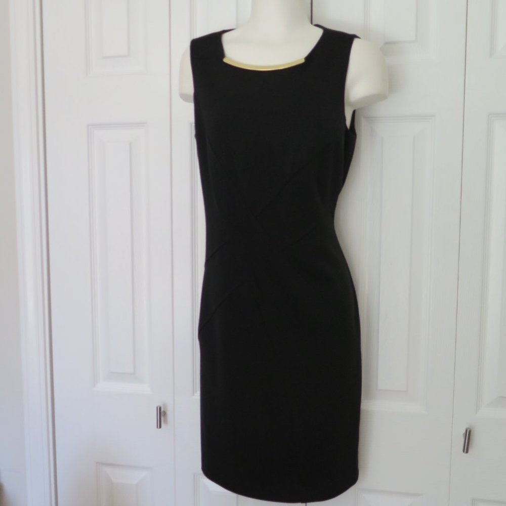 CALVIN KLEIN -  Elegant black dress with gold neckline